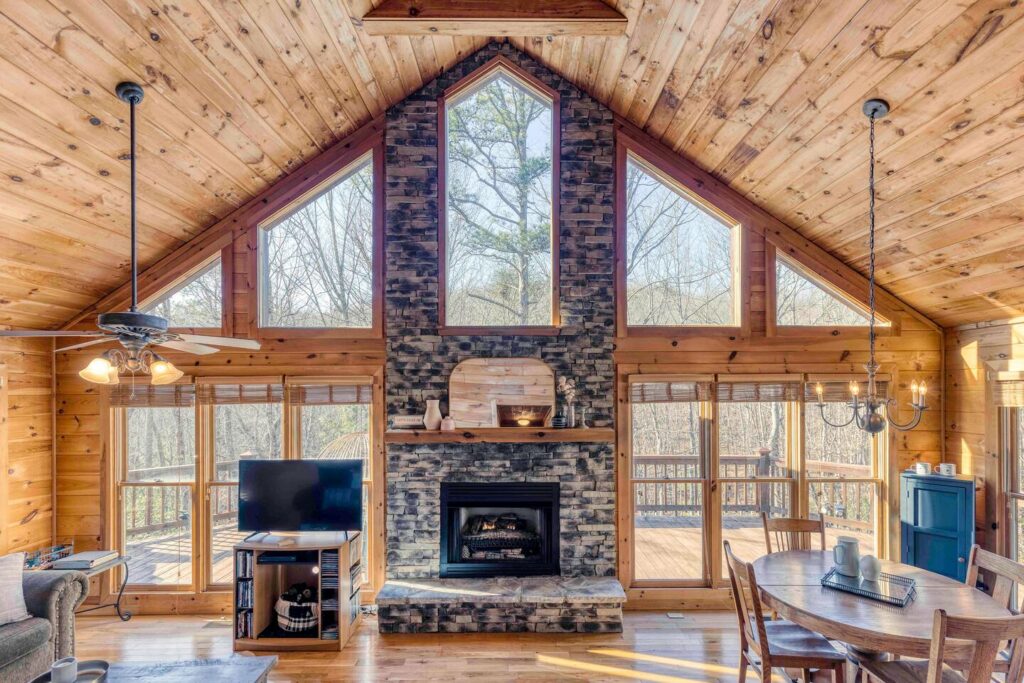 Wooden large windows inside a mountain cabin